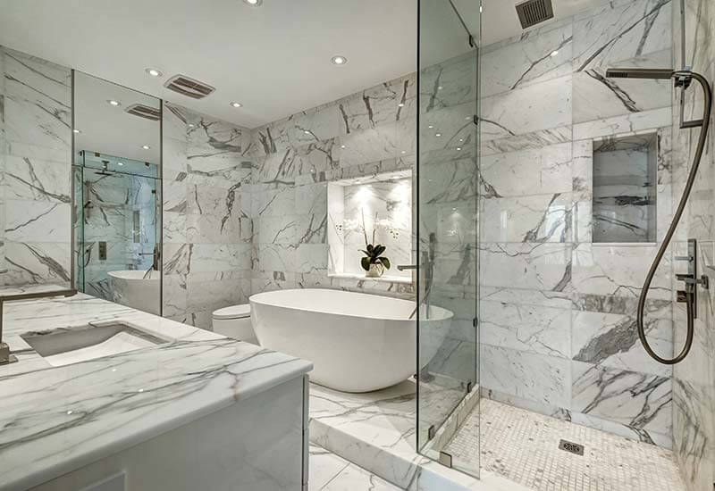 White bathroom with granite walls