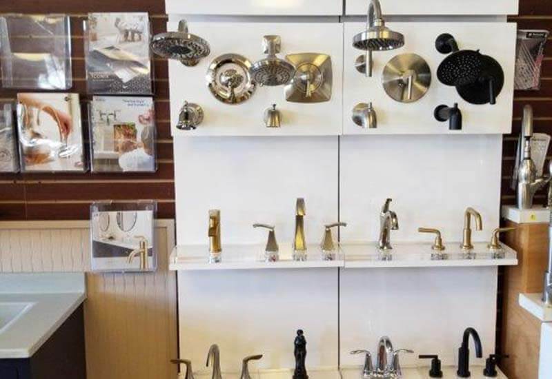 Showroom of different faucets and shower heads