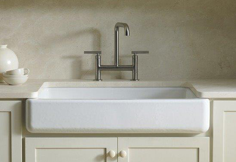 Farmhouse sink with silver faucet